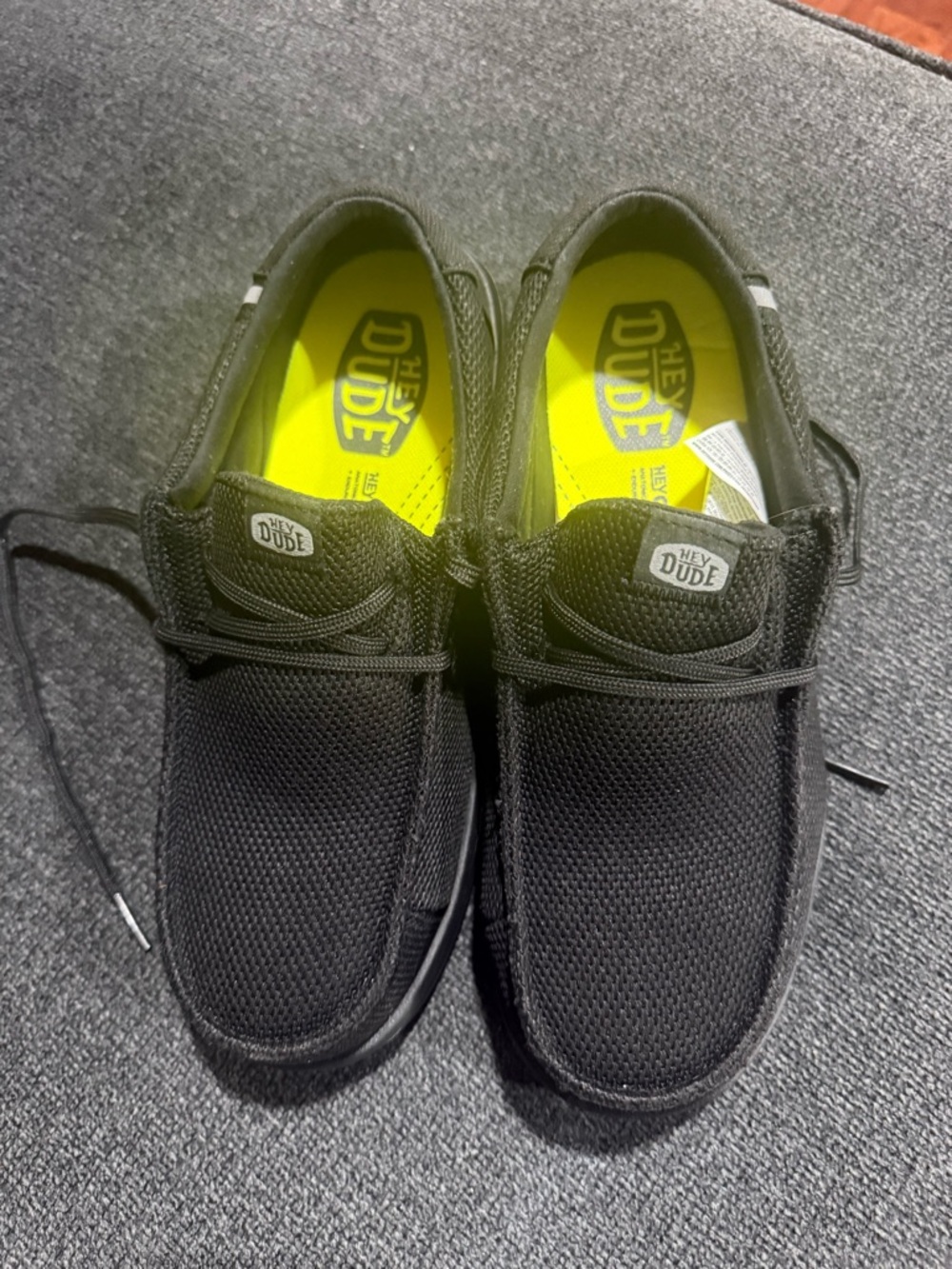HeyDude Black Slip Ons w/ Comp Toe & Neon Yellow Insole